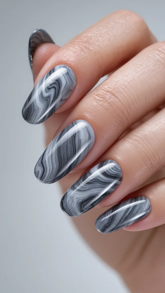 Almond Nails with Elegant Stone-Inspired Swirls