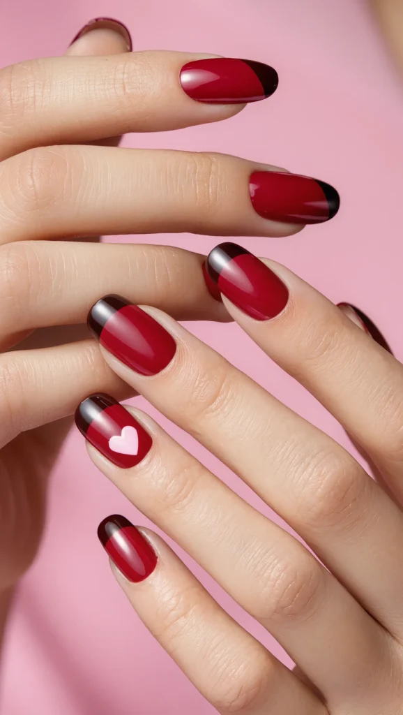 Classic Red Nails with Subtle Heart Design