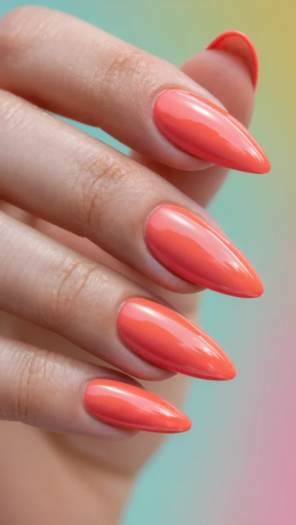 24 Long Summer Nails 2026 That Bring Glamour, Color & Endless Vacation Vibes 11 Bright Coral Stiletto Nails