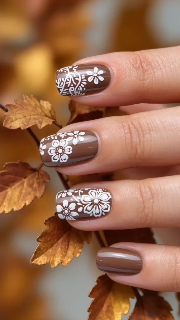 24 Fall Flower Nail Art Ideas 2026: Elegant Floral Manicures Inspired by Autumn Blooms 19 Cocoa Floral Lace