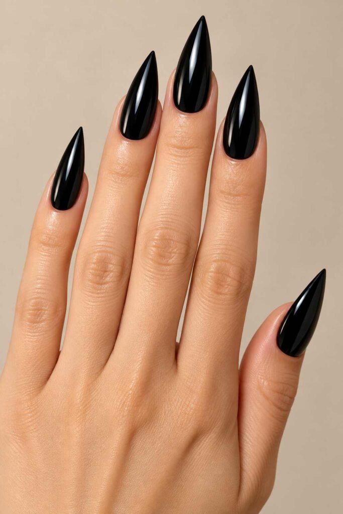 Glossy Black Stiletto Nails
